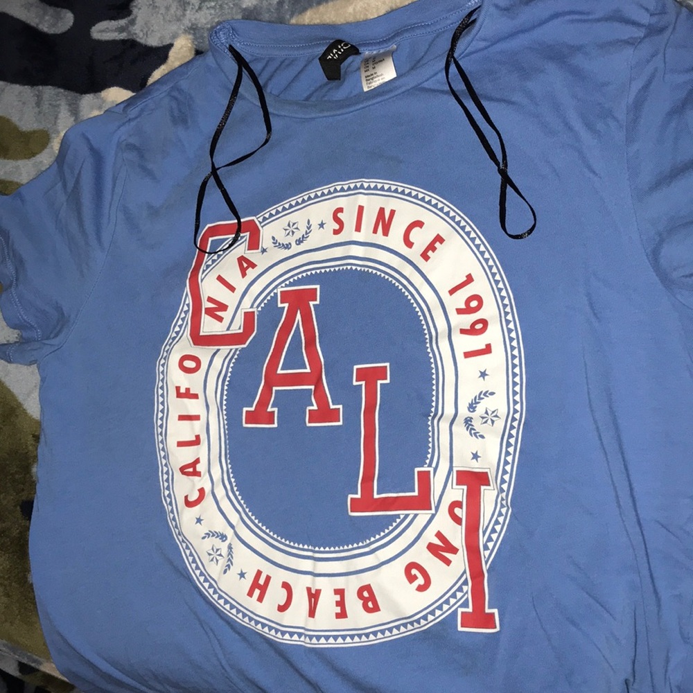 Blue and white red lettered shirt